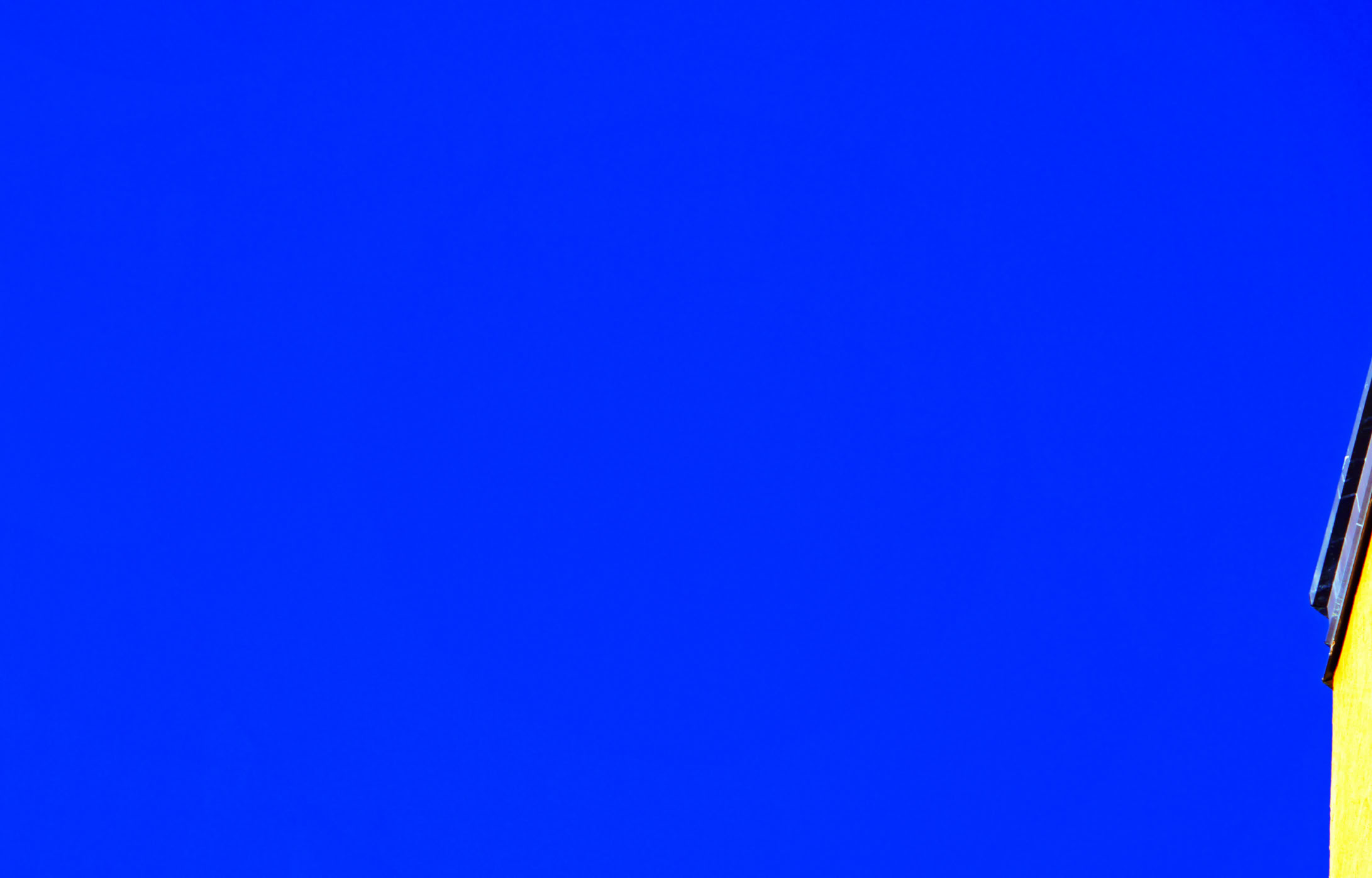 A detailed view of a professional podcast setup featuring a microphone and video camera, highlighting interview equipment.